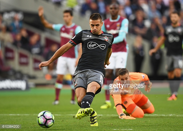 Above: Dusan Tadic firing home Southampton's second in their 3-0 win over West Ham | Photo: Getty Images 