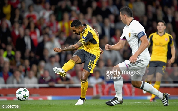 Theo Walcott grabs his second. | Photo: Getty
