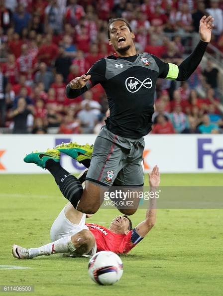 Van Dijk makes a crucial interception in the first half. Photo: Getty.