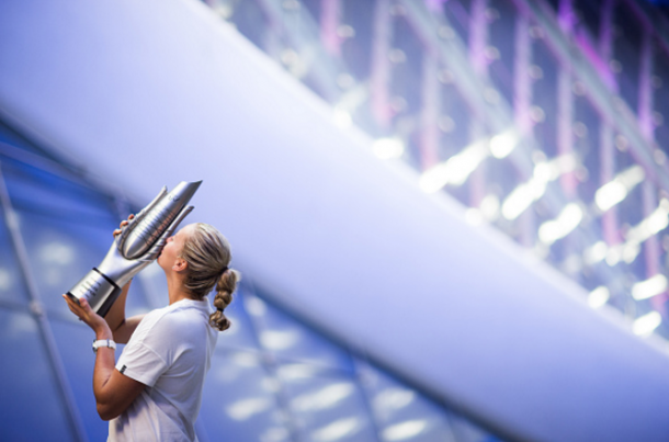 Kvitova graces with her trophy on the grounds of the Optics Valley International Tennis Centre in Wuhan after her triumph in the final. Photo credit: VCG/Getty Images.