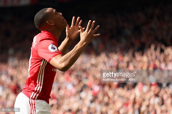 Martial celebrates his goal against Stoke last time out | Photo: Matthew Ashton - AMA / Getty Images