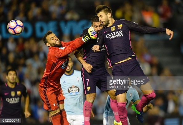 Above: Gerard Pique heading home one of his two goals in Barcelona's 4-3 defeat to Celta Vigo | Photo: Getty Images