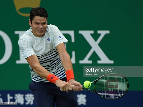 Milos Raonic hits a backhand during his third round loss to Jack Sock in Shanghai/Photo: Kevin Lee/Getty Images