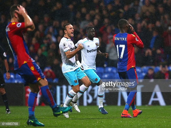 Above: Mark Noble celebrating Christian Benteke's penalty miss in West Ham's 1-0 win over Crystal Palace | Photo: Getty Images