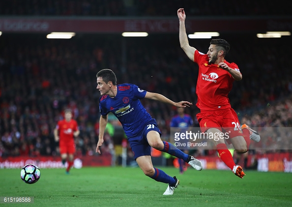 Above: Ander Herrera clashing with Adam Lallana in Manchester United's 0-0 draw with Liverpool | Photo; Getty Images 