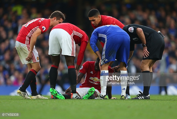 Above: Eric Bailly on the pitch injured during Manchester United's 4-0 defeat to Chelsea | Photo: Getty Images