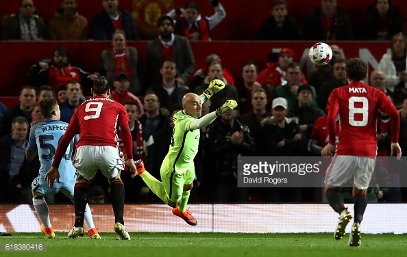 Above: Willy Caballero punching out the ball suring Manchester City's 1-0 defeat to Manchester United | Photo: Getty Images