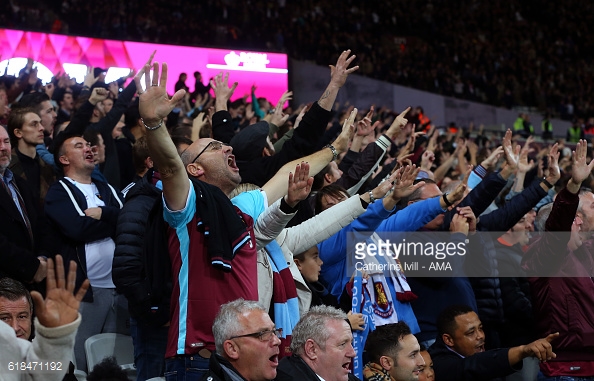 Above; West Ham United fans showing their support in their 2-1 win over Chelsea | Photo: Getty Images