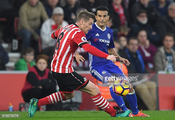 Davis battles with former Barcelona man Pedro. Photo: Darren Walsh/Getty