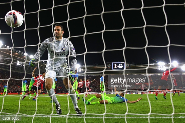 van Dijk wheels away after equalising against Inter Milan. Photo: Getty Images / Michael Steele