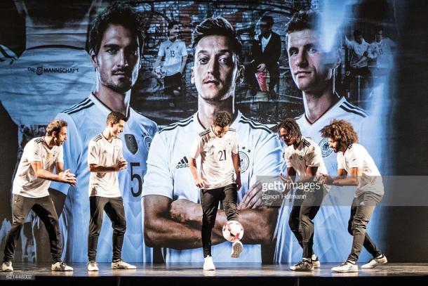 İlkay Gündoğan performs at the ADIDAS launch alongside his Germany teammates. (Photo: Simon Hofmann/Getty Images)