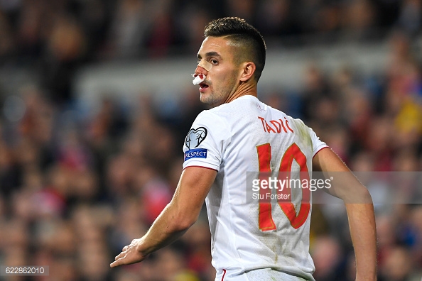 A battered and bruised Tadic battles through the pain. Photo: Stu Forster- Getty