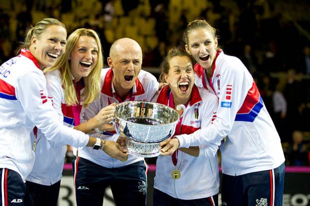 Kvitova (second from left) celebrating Czech Republic's Fed Cup triumph with the Czech team, where they defeated France in the final for their fifth title in the last six years. Photo credit: NurPhoto/Getty Images.