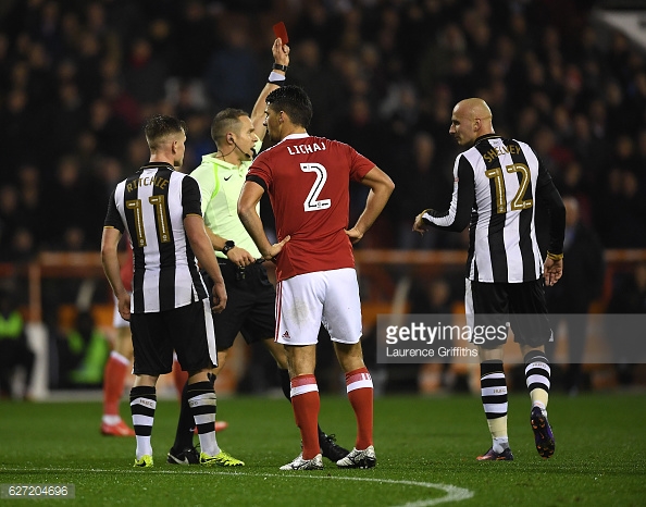 Shelvey receives his marching orders for apparently kicking out at Henri Lansbury. Photo: Laurence Griffiths/ Getty