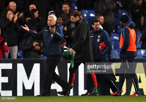 Pardew gestures towards the fans at Selhurst Park, thanking them for their support. Photo: Getty/Christopher Lee