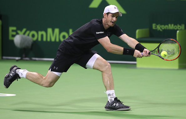 Andy Murray hitting a backhand during his quarterfinal match at the Qatar ExxonMobil Open. Photo: Getty Images/Karim Jaafar