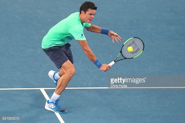 Raonic plays a backhand during his second round win/Photo: Chris Hyde/Getty Images