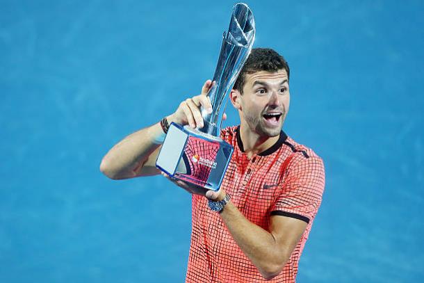 Dimitrov after winning the title in Brisbane (Getty/Chris Hyde)