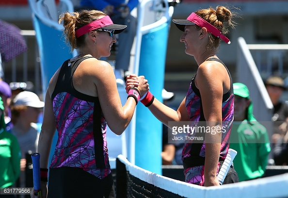 Shvedova and Begu meet at the net after their first round match in Melbourne/Photo: Jack Thomas/Getty Images