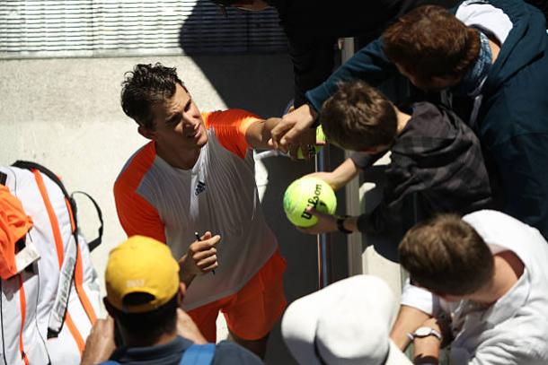 Thiem signs autographs after his third round win in Melbourne last season (Getty/Mark Kolbe)