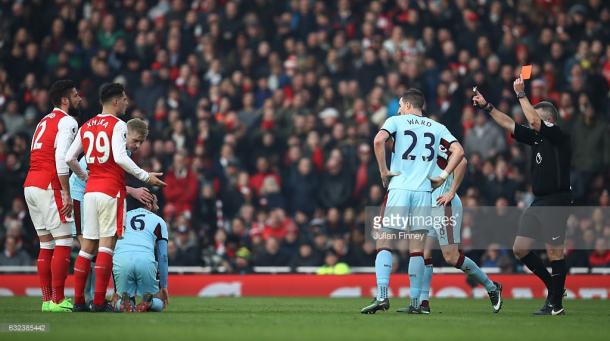 Granit Xhaka is given his marching orders. | Photo: Getty Images/Julian Finney