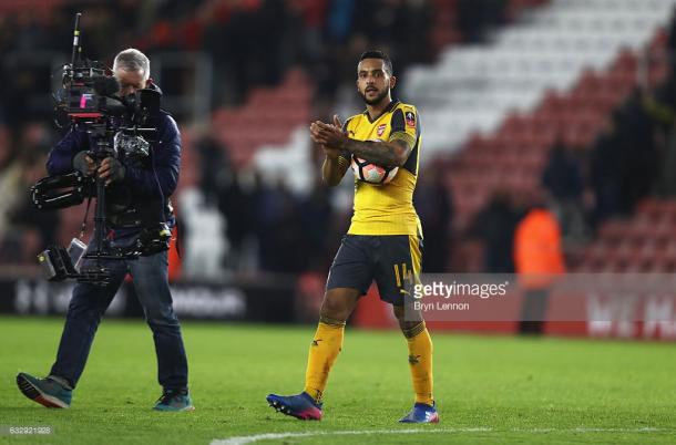 Theo Walcott's hattrick helped Arsenal sail into Round Five. | Photo: Getty Images/Bryn Lennon