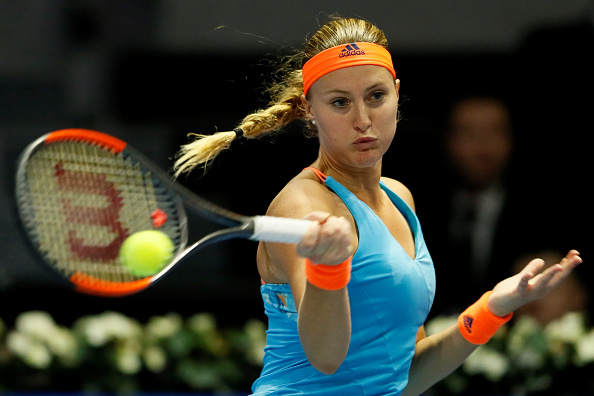 Mladenovic gets the late crucial break | Photo: Mike Kireev/NurPhotos via Getty Images