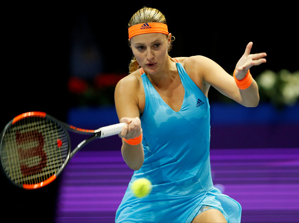 Mladenovic serves her way to take the first set | Photo: Mike Kireev/NurPhotos via Getty Images