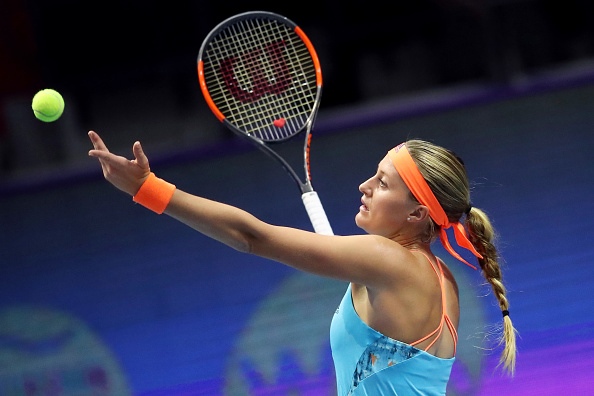 Kristina Mladenovic serves during the final | Photo: Kommersant Photo via Getty Images