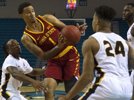 Weiler-Babb drives past two Appalachian State defenders/Photo: Joshua S. Kelly/USA Today Sports