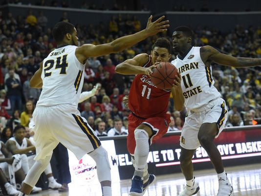 Kevin McClain tries to drive between two Murray State defenders during the OVC title game/Photo: Sam Simpkins/Belmont University