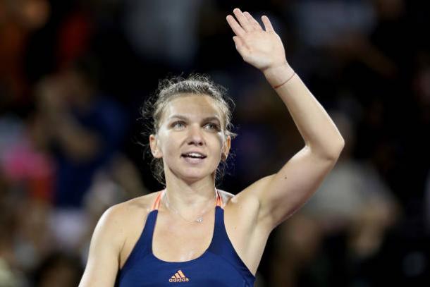 Halep waves to the crowd after a win at the Miami Open last month. Photo credit: Matthew Stockman/Getty Images.