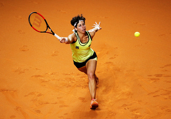 Suarez Navarro hangs on | Photo: Adam Pretty/Getty Images