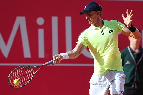Kevin Anderson from South Africa in action during the match between Gilles Muller From Luxembourg and Kevin Anderson from South Africa for Millennium Estoril Open at Clube de Tenis do Estoril on May 6, 2017 in Estoril, Portugal. (Photo by Carlos Rodrigues/Getty Images)