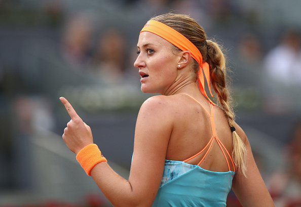 Mladenovic giving it everything she had to force the decider | Photo: Julian Finney/Getty Images