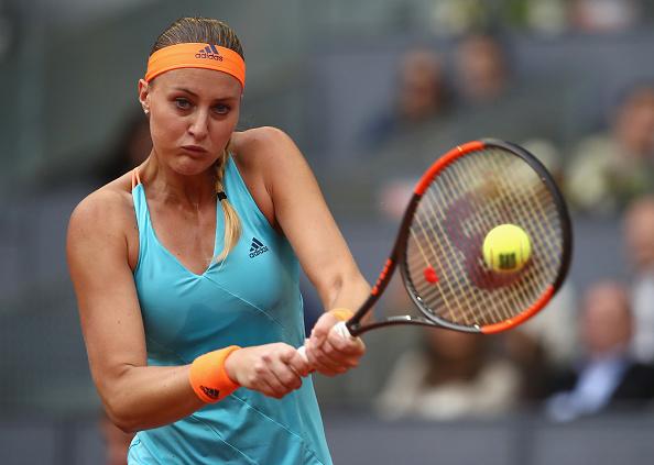 Mladenovic has the chance to serve for the set | Photo: Julian Finney/Getty Images