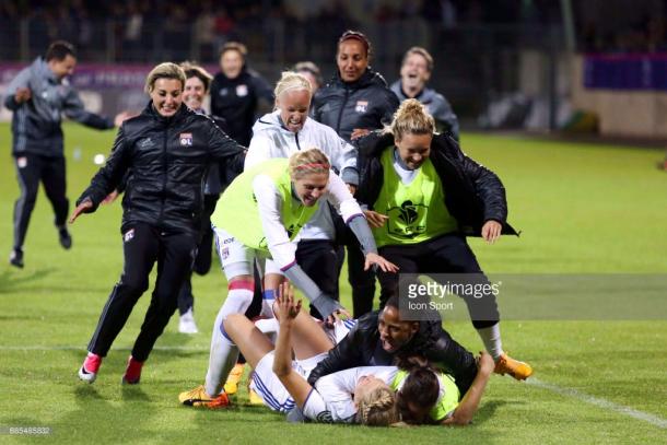 Hegerberg is mobbed by her teammates after scoring the winning penalty in the CdF final (Credit: Getty/Icon Sport)