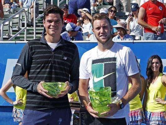 Jack Sock (right) was gifted the Delray Beach title last year when Milos Raonic (left) withdrew. Photo: Joel Auerback/AP