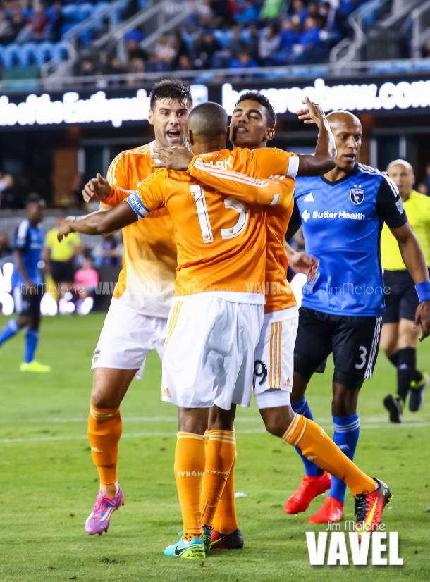 Ricardo Clark (13) of Houston Dynamo celebrates with teammates after scoring the game’s first goal in the 6th minute of the first half of play.  / Jim Malone - VAVEL USA