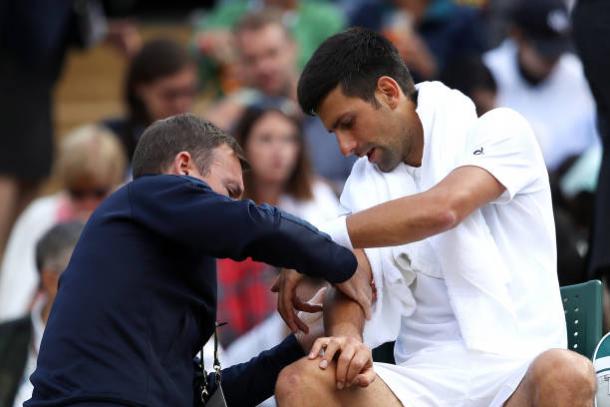 Djokovic was forced to retire from Wimbledon due to his elbow injury (Getty/Julian Finney)