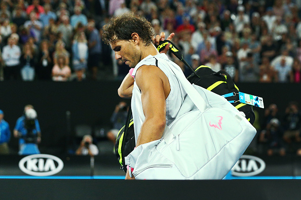 Rafael Nadal leaves Rod Lavaer Arena after pulling out in the fifth set against Marin Cilic last month (Photo: Michael Dodge/Getty Images)