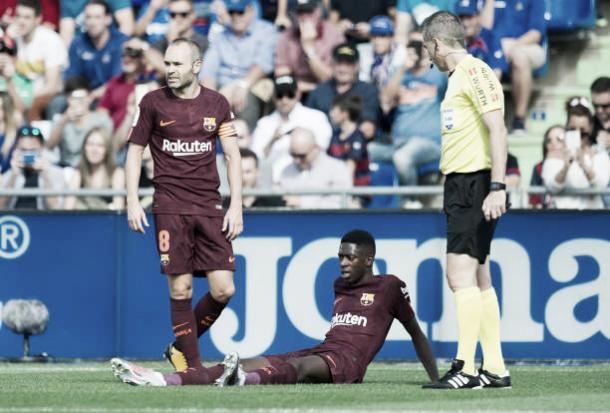 Momento em que Dembélé sentiu a lesão | Foto: Denis Doyle/Getty Images