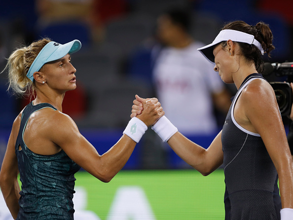 Tsurenko and Muguruza meet after their match (Getty/Kevin Lee)