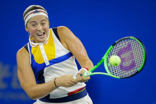 Ostapenko in action during her win over Muguruza in Wuhan (Getty/Wang He)