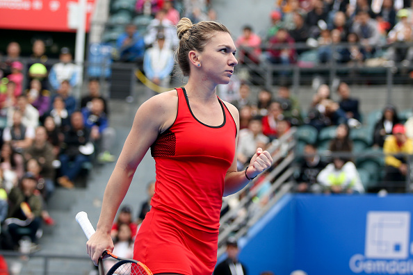 Simona Halep celebrates winning a point against Duan | Photo: Wu Zhizhao / Getty Images AsiaPac