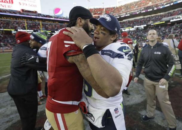 Colin Kaepernick and Russell Wilson |Jan. 1, 2017. AP Photo/Marcio Jose Sanchez|