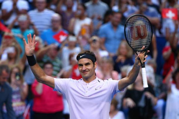 Federer celebrates after going unbeaten in singles rubbers this week (Getty/Paul Kane)