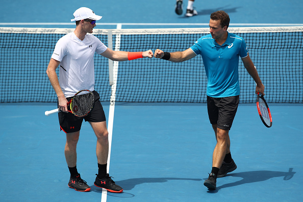 Jamie Murray and Bruno Soares fist pumping in between points (Photo: Clive Brunskill/Getty Images)