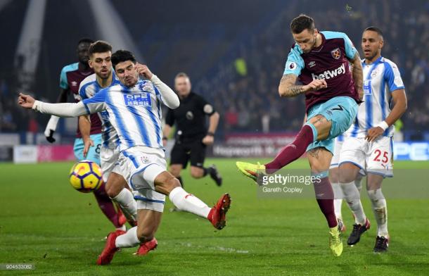 HUDDERSFIELD, ENGLAND - JANUARY 13: Marko Arnautovic of West Ham United scores their second goal during the Premier League match between Huddersfield Town and West Ham United at John Smith's Stadium on January 13, 2018 in Huddersfield, England. (Photo by Gareth Copley/Getty Images)