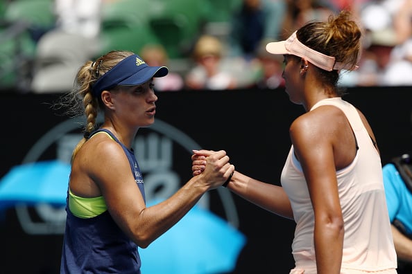 Angelique Kerber (L) shakes hands with Madison Keys (R) after their quarterfinal match at the Australian Open. (Photo: Getty Images/Clive Brunskill)